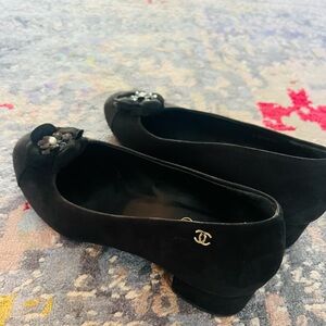 CHANEL Black Flats with Floral Accent